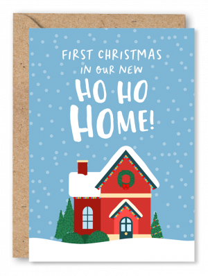 A blue Christmas card featuring an illustration of a red house, with snow on the roof and fairy lights strung below the rafters. White text above reads ‘First Christmas in our new Ho Ho Home’