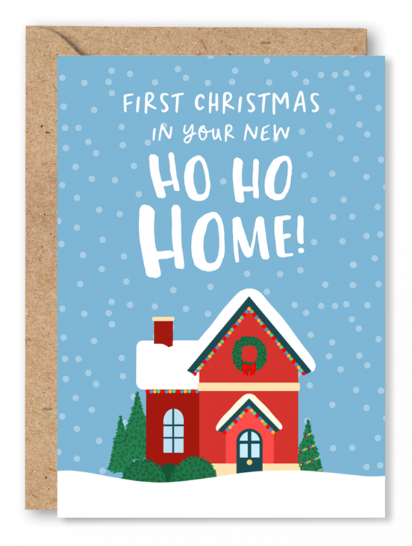 A blue Christmas card featuring an illustration of a red house, with snow on the roof and fairy lights strung below the rafters. White text above reads ‘First Christmas in your Ho Ho Home’